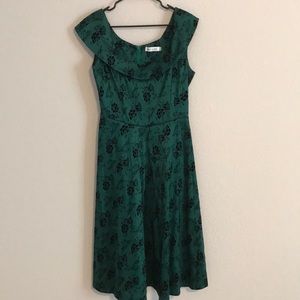 Green and black floral dress